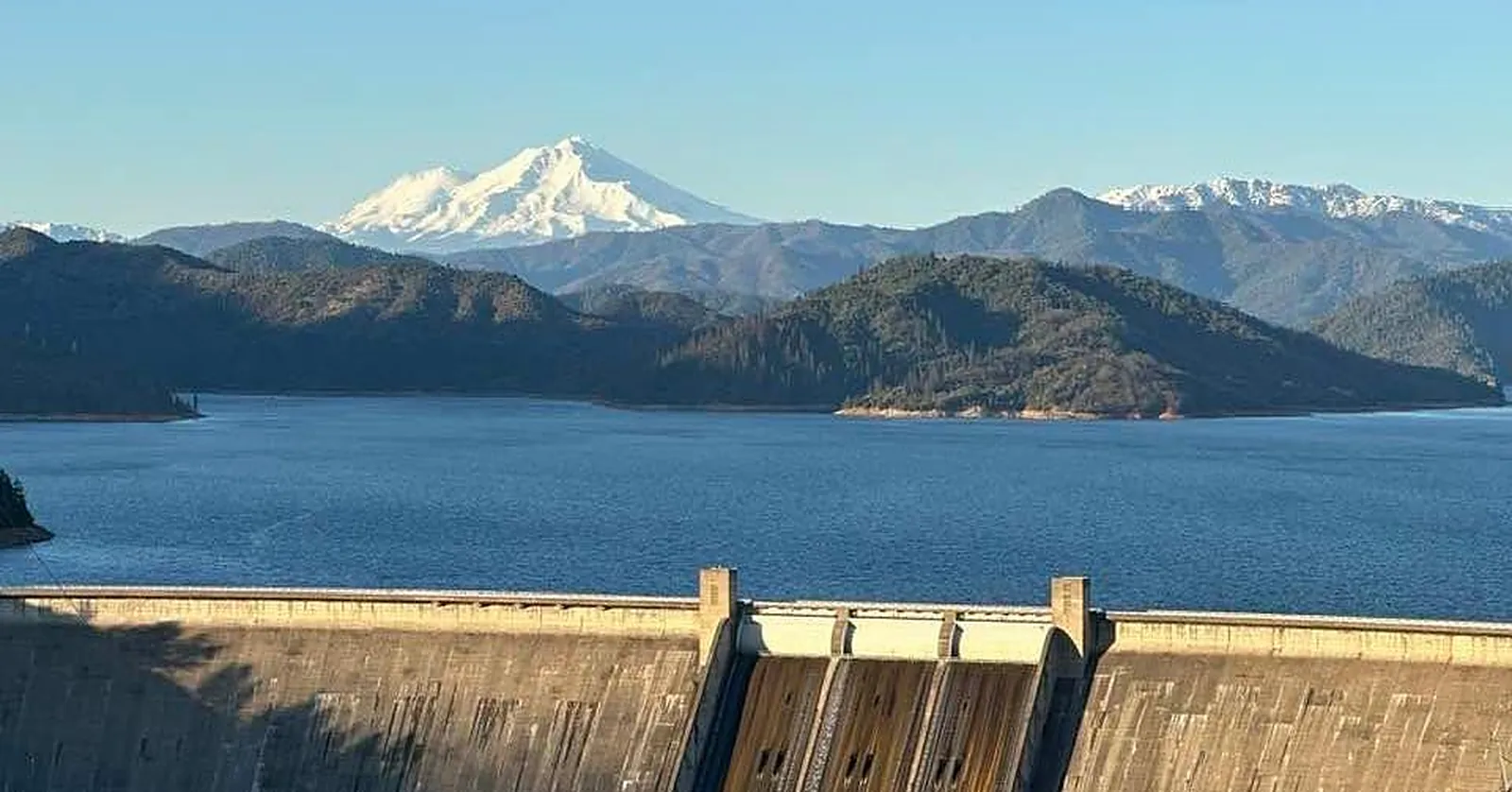 Mount Shasta and Shasta Lake seen from the top of Shasta Dam